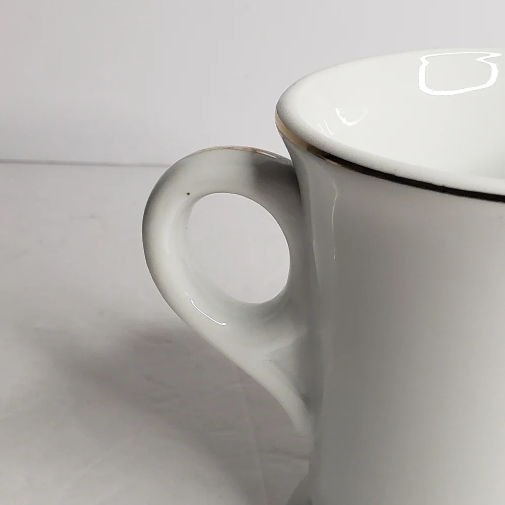 Vintage ceramic mug featuring a patriotic design.  247